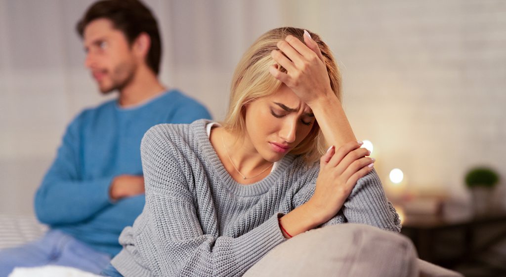 depressed woman ignoring her partner